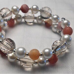 Handmade jewelry set with memory wire bracelets and earrings